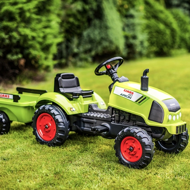 Tracteur à pédales Claas Arion 410 avec remorque