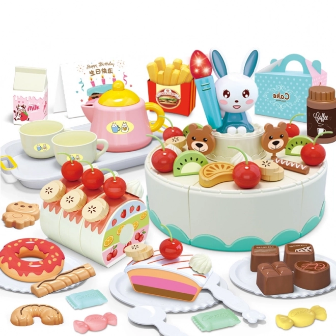 Pâtisserie avec gâteau d'anniversaire et ensemble à thé Woopie
