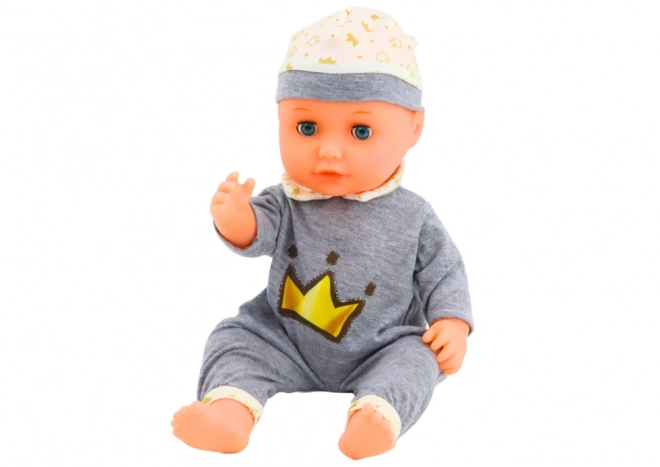 Poupée bébé interactive en pyjama gris