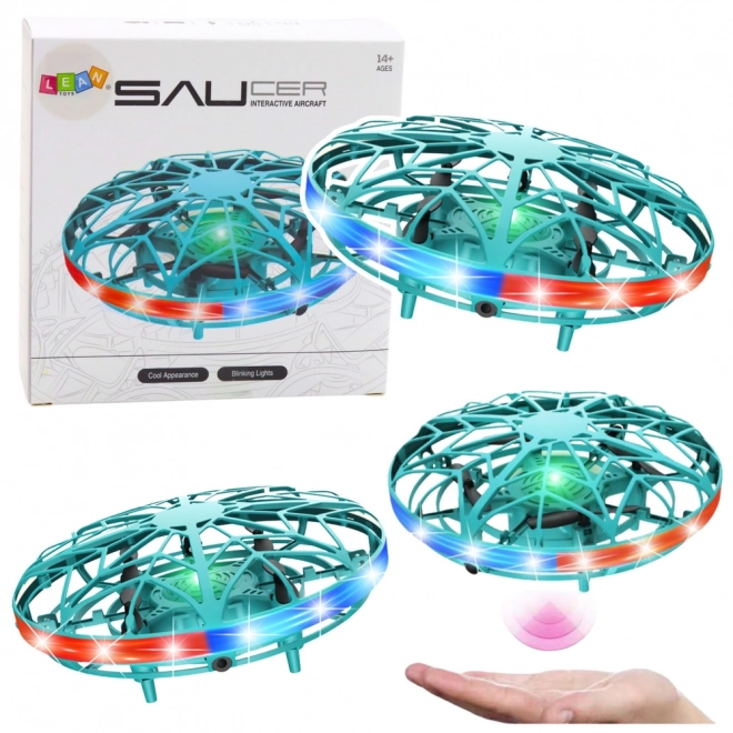 Drone UFO contrôlé à la main avec lumières LED turquoise