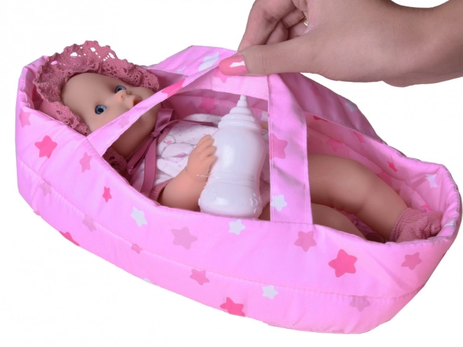 Poupée bébé avec porte-bébé
