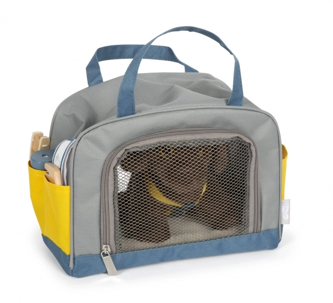 Petit chien en peluche avec set de soins