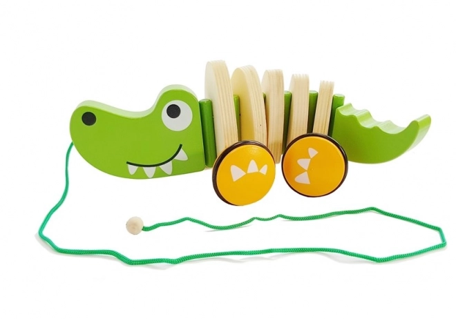 Crocodile en bois sur roulettes 18cm