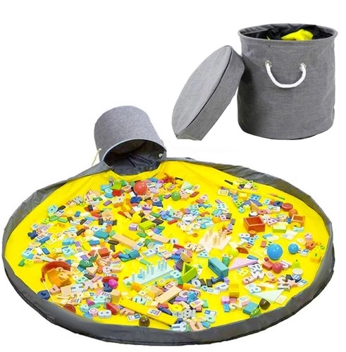 Panier à jouets gris avec tapis