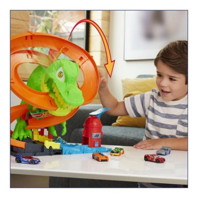 T-rex attaque la caserne des pompiers de Hot Wheels city