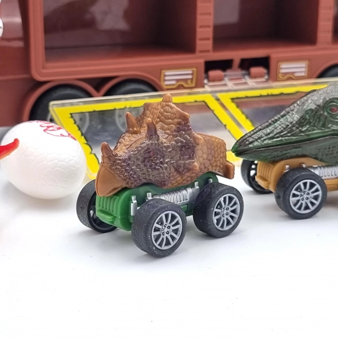 Camion dinosaure avec lanceur et petites voitures