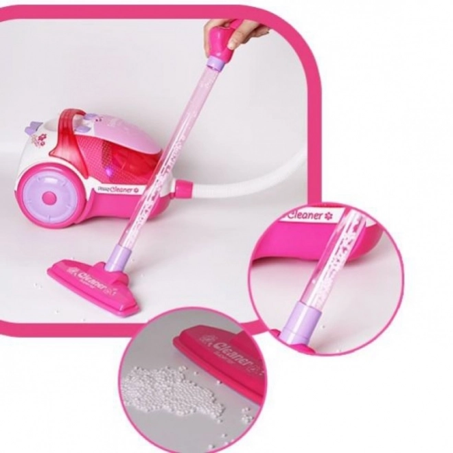 Aspirateur rose pour enfants avec fonction d'aspiration