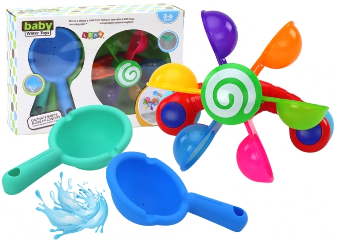 Jouet de bain rotatif avec bols colorés et deux cuillères