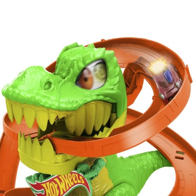 T-rex attaque la caserne des pompiers de Hot Wheels city