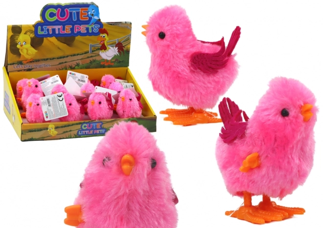 Jouet sauteur poussin rose