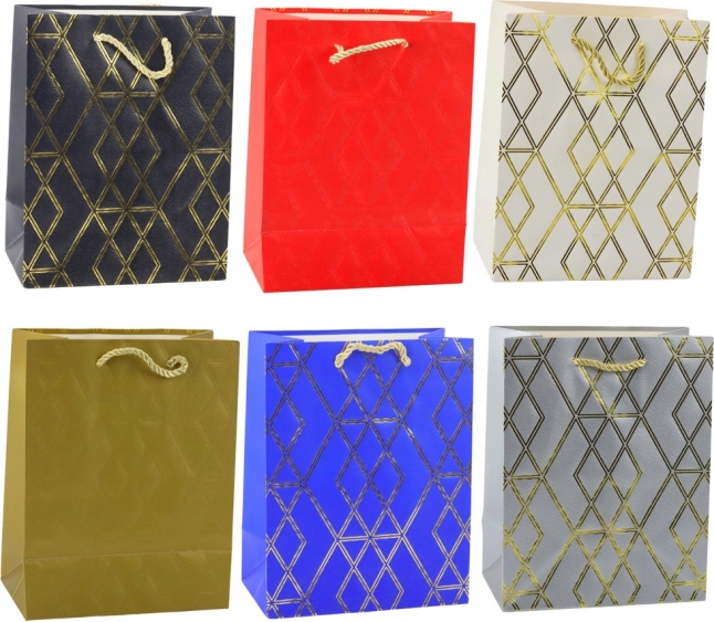 Sac cadeau en papier avec motifs dorés