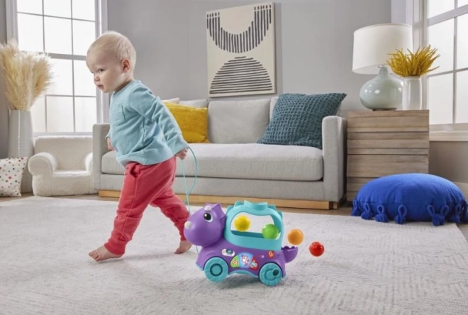 Jouet interactif Dino avec balles bondissantes