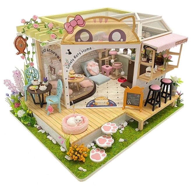 Maquette miniature du café à chats avec jardin
