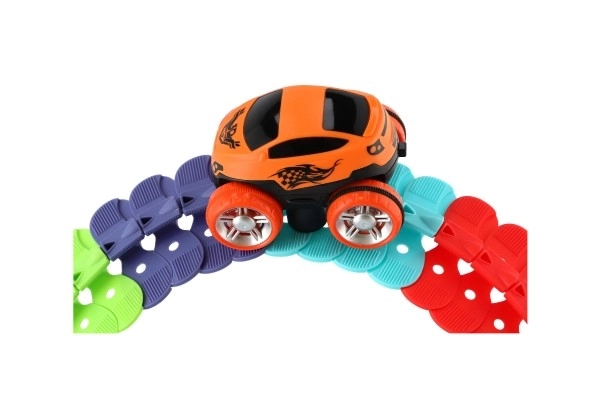 Circuit de course pour enfants avec pièces interchangeables et petite voiture lumineuse