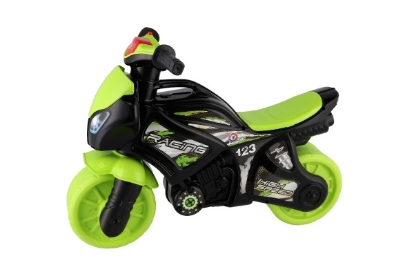 Trottinette moto vert-noir en plastique à batterie avec lumière et son, dans un sac 36x53x74cm