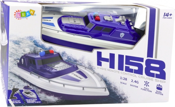 Bateau à moteur de police télécommandé bleu
