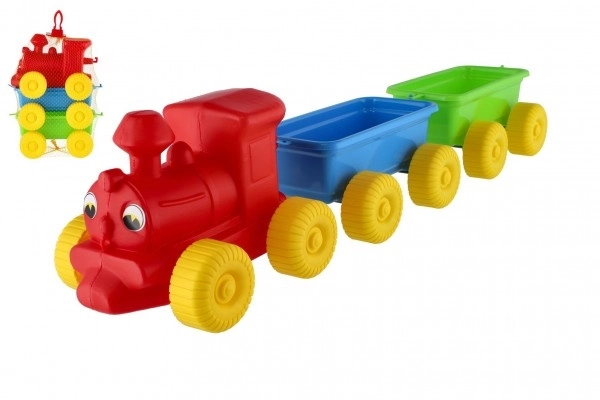 Train + 2 wagons en plastique 60 cm dans un filet
