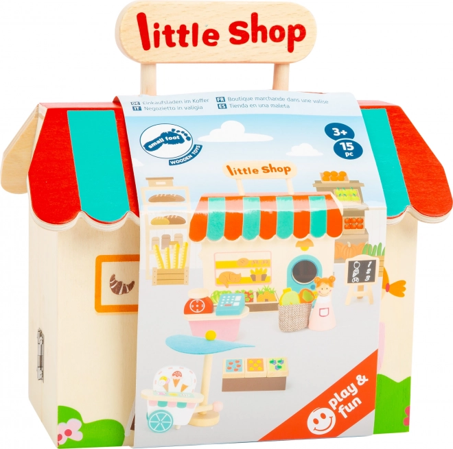 Boutique en bois dans une valise de Small Foot