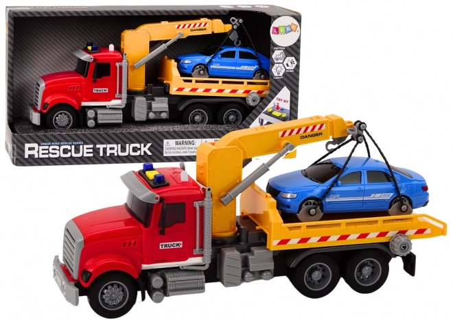 Camion de remorquage rouge avec grue et effets lumineux
