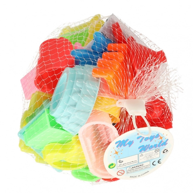 Jouets colorés pour le sable - pelles et moules