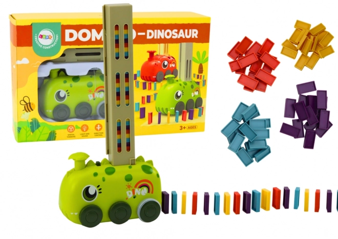 Petite voiture verte DINOSAUR à piles construisant des dominos colorés