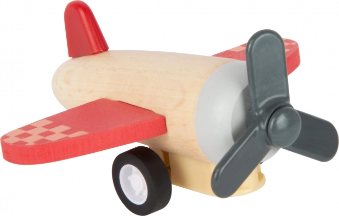 Jouets en bois à remontoir – avions et fusée