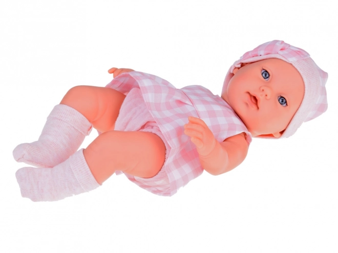 Poupée en tissu bébé nouveau-né avec bonnet rose
