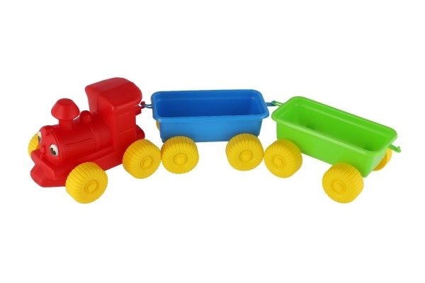 Train + 2 wagons en plastique 60 cm dans un filet