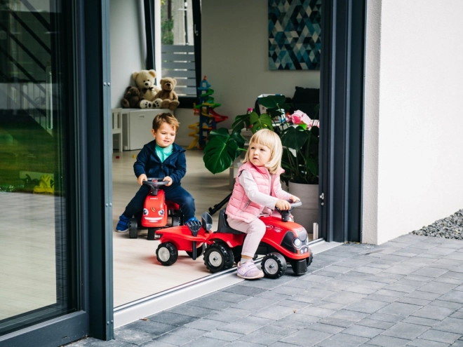 Tracteur à pédales Baby Case IH rouge avec remorque