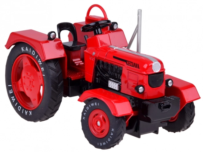 Tracteur métallique rouge avec roues en caoutchouc 1:18