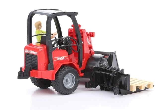Chargeur rouge Bruder Schäffer 2034 avec figurine et accessoires
