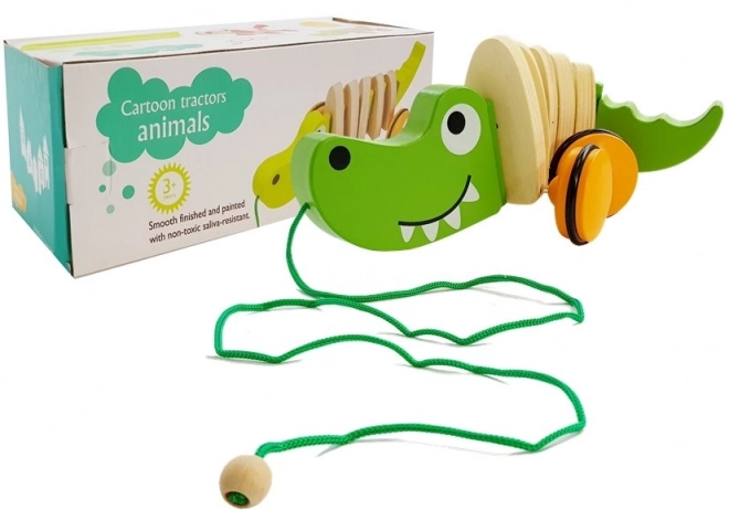 Crocodile en bois sur roulettes 18cm