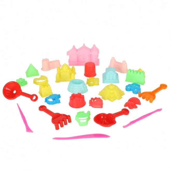Jouets colorés pour le sable - pelles et moules