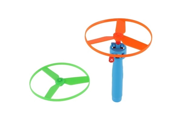 Toupie à élastique + lanceur plastique 9cm 2 couleurs en sachet