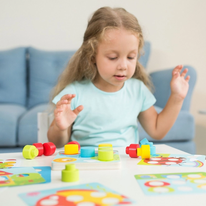 Mosaïque colorée Lucy & Leo - jeu en bois avec de gros picots et modèles