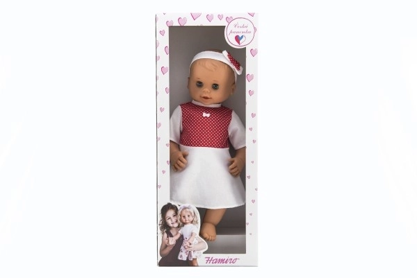 Poupée Hamiro à yeux dormeurs 50 cm avec corps rigide et robe blanche à pois rouges
