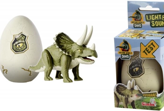 Figurine de dinosaure lumineuse dans un œuf