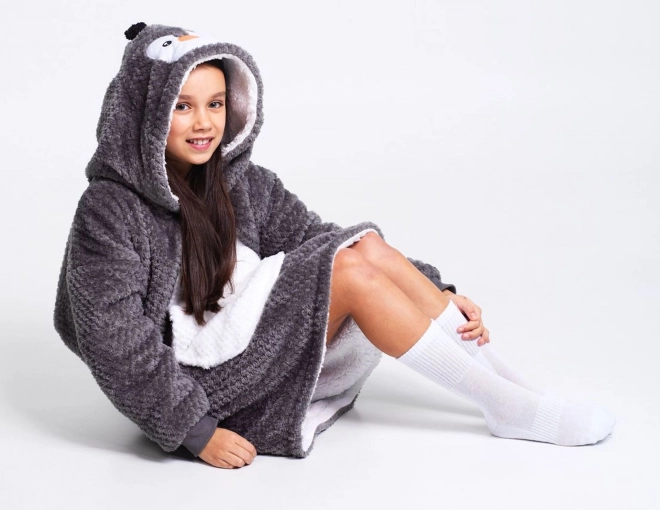 Cozy Noxxiez CH323 Pingouin - couverture à capuche télévisée et chauffante pour enfants 7 - 12 ans