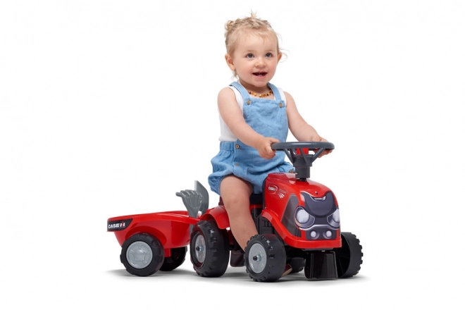 Tracteur à pédales Baby Case IH rouge avec remorque