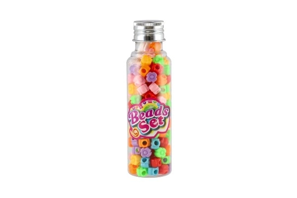 Perles avec ficelle en plastique mix de couleurs dans une boîte en plastique 3,5x12,5cm