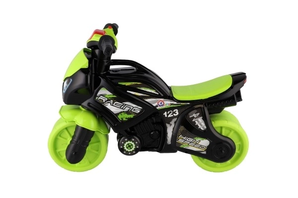 Trottinette moto vert-noir en plastique à batterie avec lumière et son, dans un sac 36x53x74cm