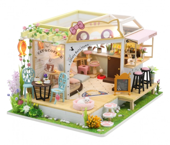 Maquette miniature du café à chats avec jardin