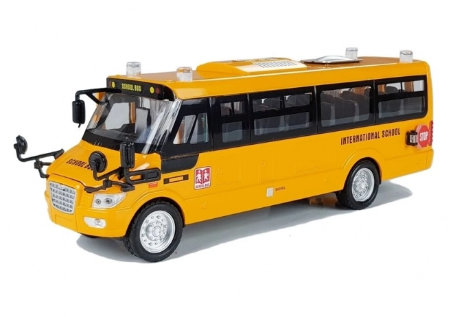Autobus scolaire en métal avec moteur à remontoir