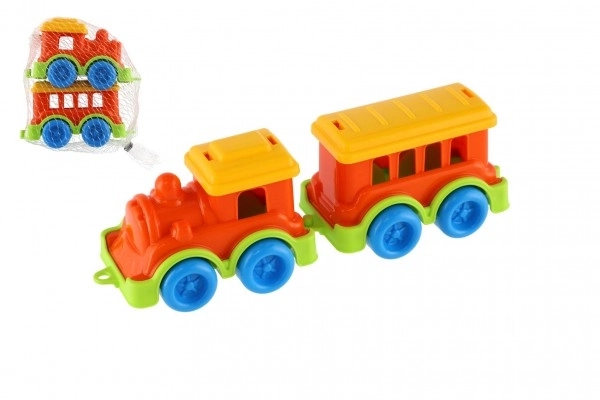Petit train en plastique avec wagon