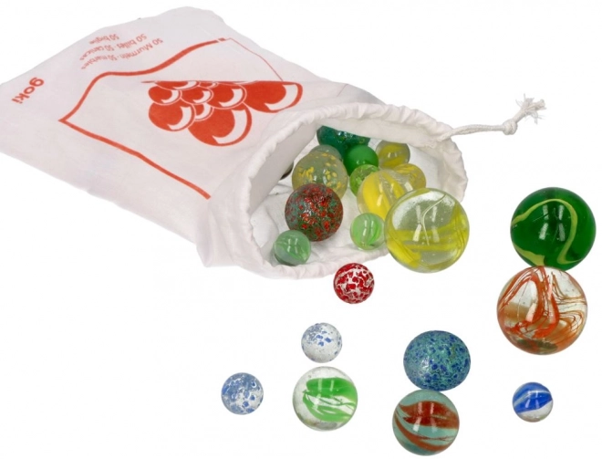 Billes en verre dans un sac Goki, 50 pcs