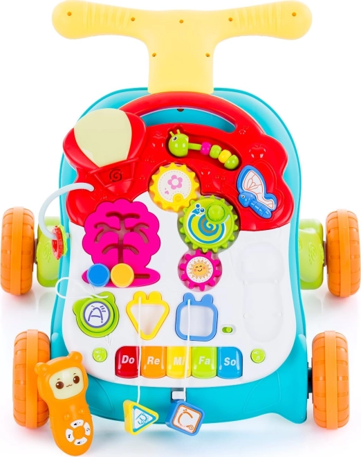 2-en-1 : trotteur et table de jeu