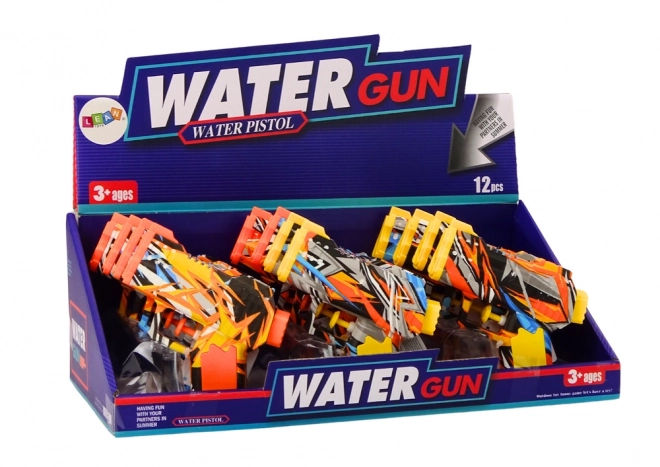 Petite pistolet à eau jaune orange graffiti