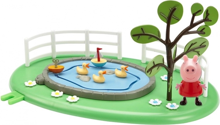 Étang avec petits bateaux et canetons