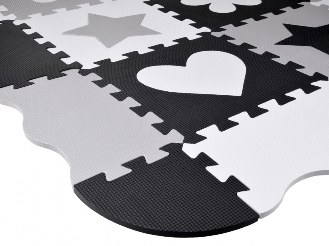 Tapis de puzzle en mousse contrastée avec formes
