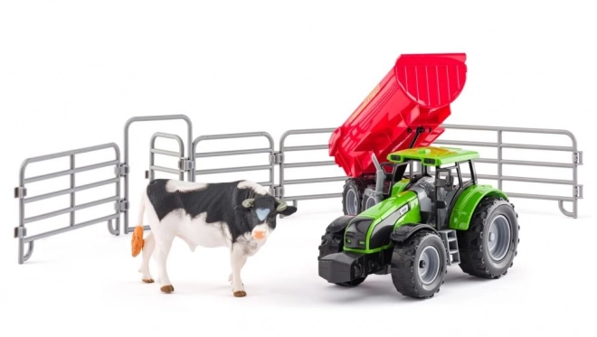 Tracteur avec remorque et taureau avec jardin